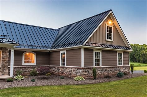 gray house brown metal roof|black house brown roof.